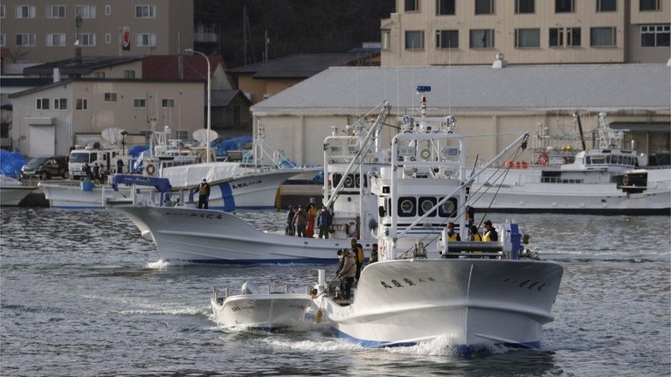 A fishing boat leaves from Utoro port for searching for the missing tour boat "Kazu 1" in Shari, Hokkaido Prefecture, Japan