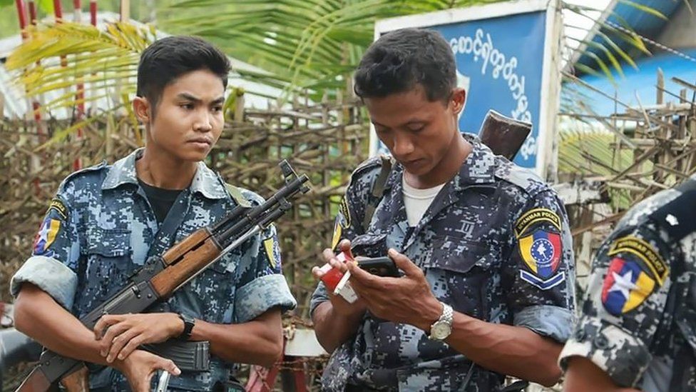 In this photograph taken on October 10, 2016, armed Myanmar border police stand guard in the village of Maungdaw, located in Rakhine State. Myanmar's army on October 10 hunted the attackers who staged deadly raids on border posts,