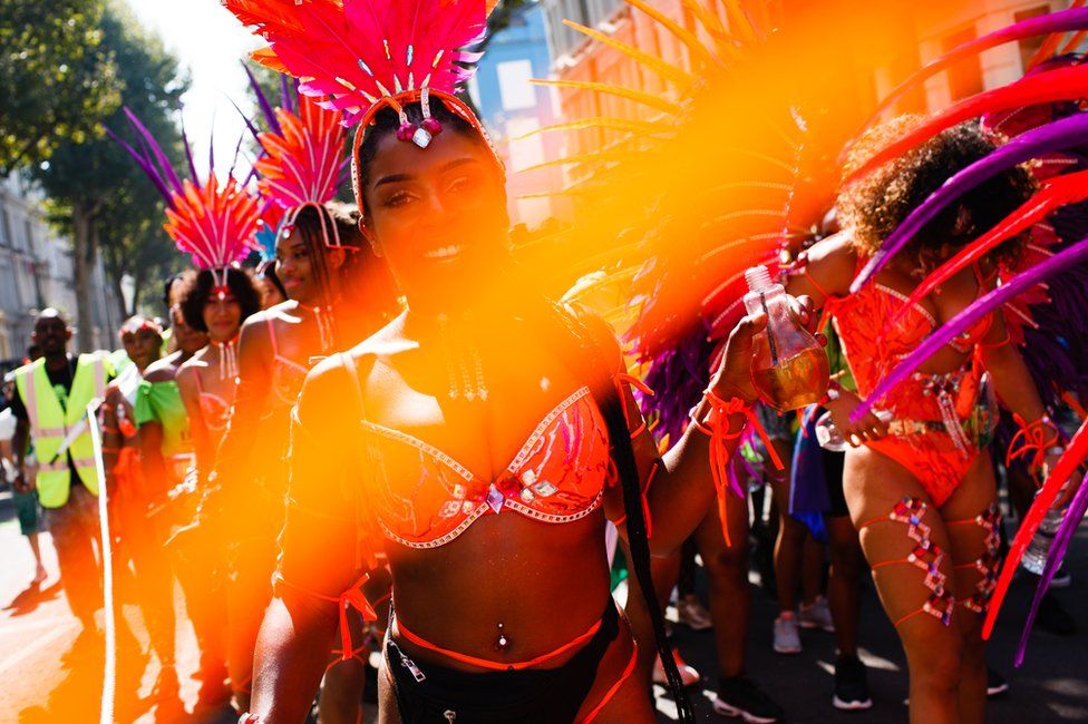 Revellers take part in the Notting Hill Carnival