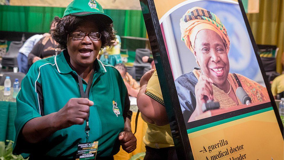 A delegate of the African National Womens League (ANCWL) chants in support former African Union Chair and current African National Congress (ANC) front runners for ANC President, Nkosazana Dlamini-Zuma (pictured on poster) during the Kwazulu-Natal ANC Womens League (ANCWL) Provincial Conference at the Playhouse theatre of Durban on September 3, 2017.