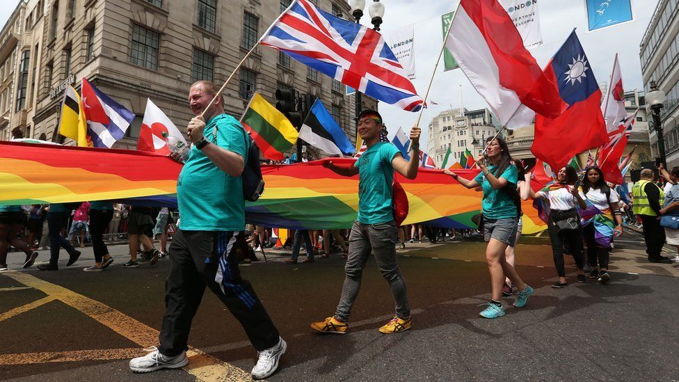People take part in the Pride in London Parade