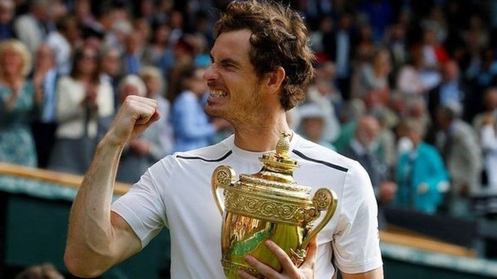 Andy Murray celebrates with the Wimbledon trophy in 2016