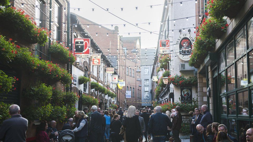 People at Commercial Court in Belfast's Cathedral Quarter