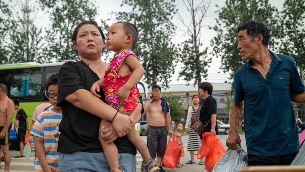 Stranded locals registering themselves at relief shelters