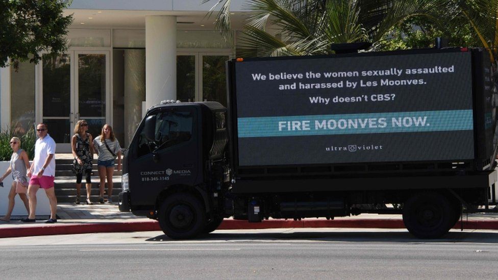 Slogan urging Mr Moonves' removal, California
