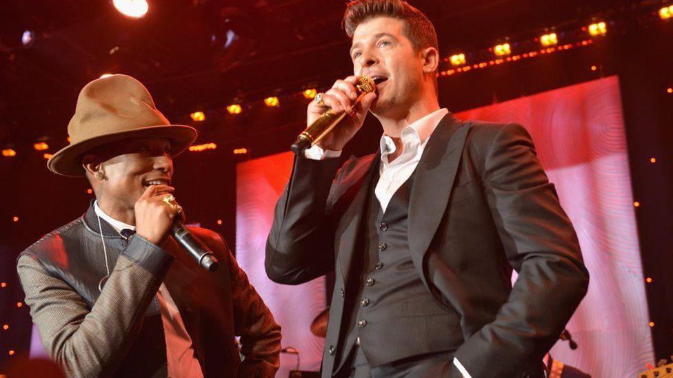 Pharrell Williams and Robin Thicke perform at the Grammy Awards - 25 January 2015