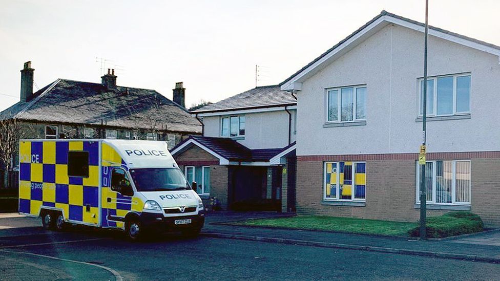 police van at the home