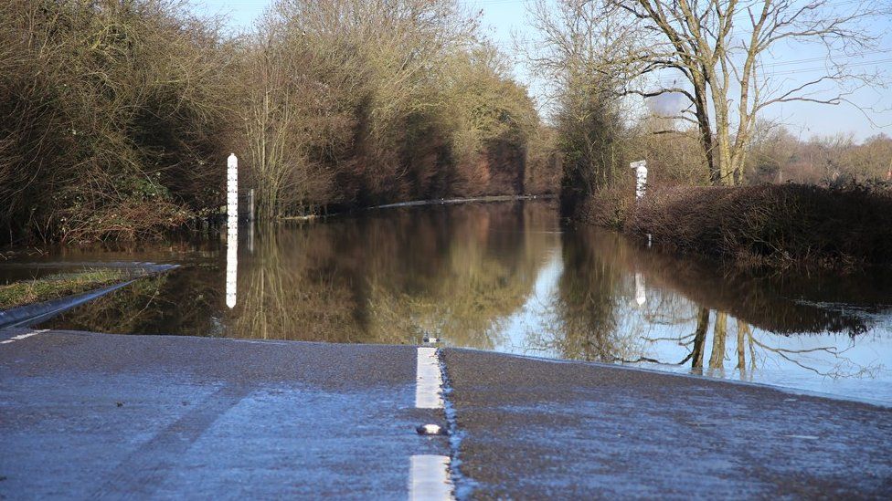 A flooded road in Gloucester