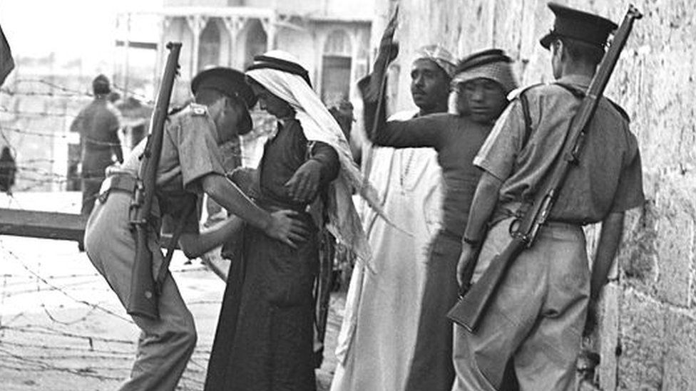 British soldiers search Arabs in Palestine
