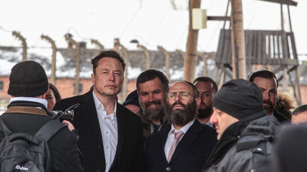 Elon Musk at the site of the Auschwitz-Birkenau Nazi German death camp