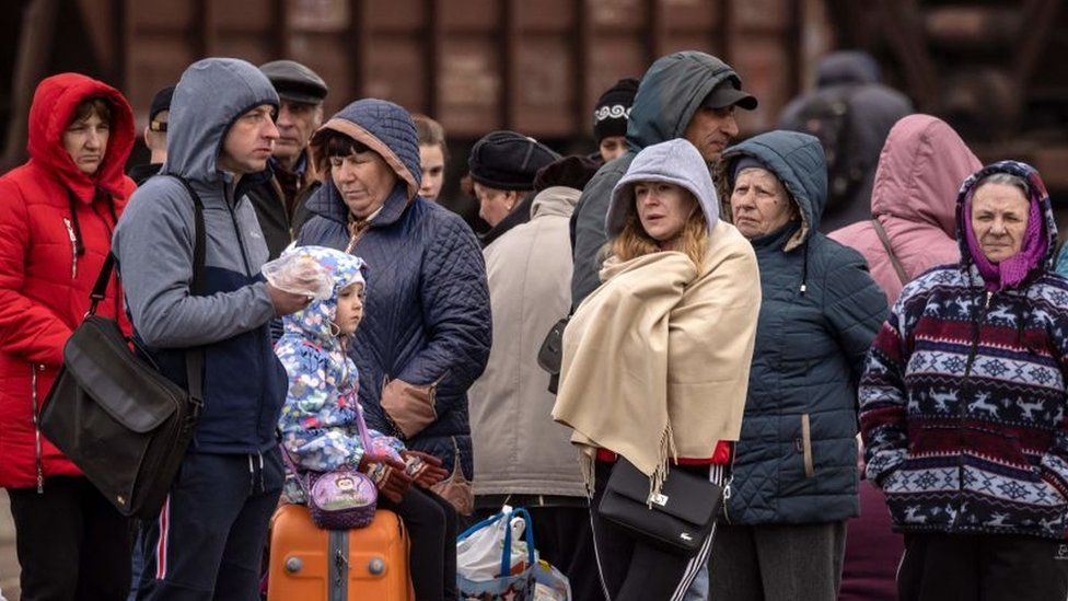 Families wait to board a train at Kramatorsk central station in the Donbass region of Ukraine on 5 April 2022.