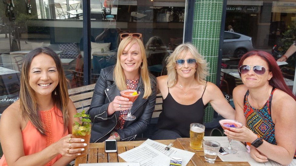 Four women with mocktails