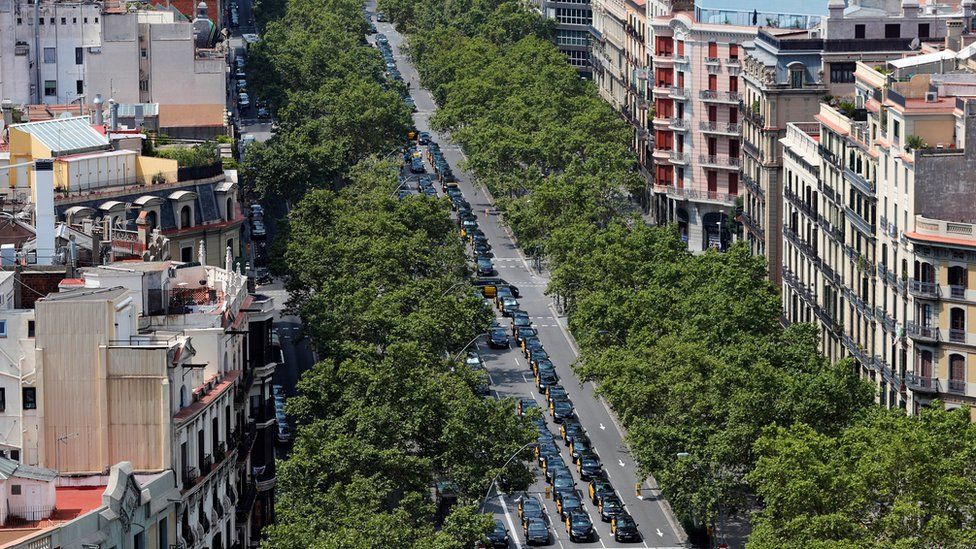 Hundreds of parked taxi vehicles occupy the Gran Via avenue in downtown Barcelona, north-eastern Spain, 29 July 2018