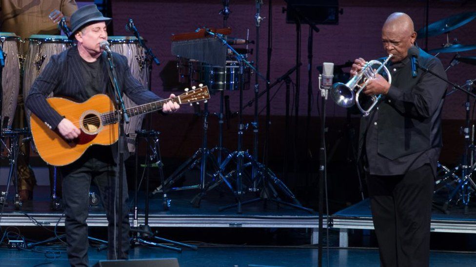 Paul Simon (L) and Hugh Masekela perform in concert on April 4, 2014 in New York, United State