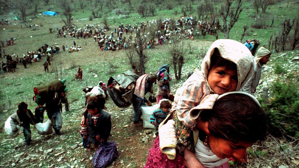 Kurdish refugees fleeing near the Iraqi-Turkish border in April 1992