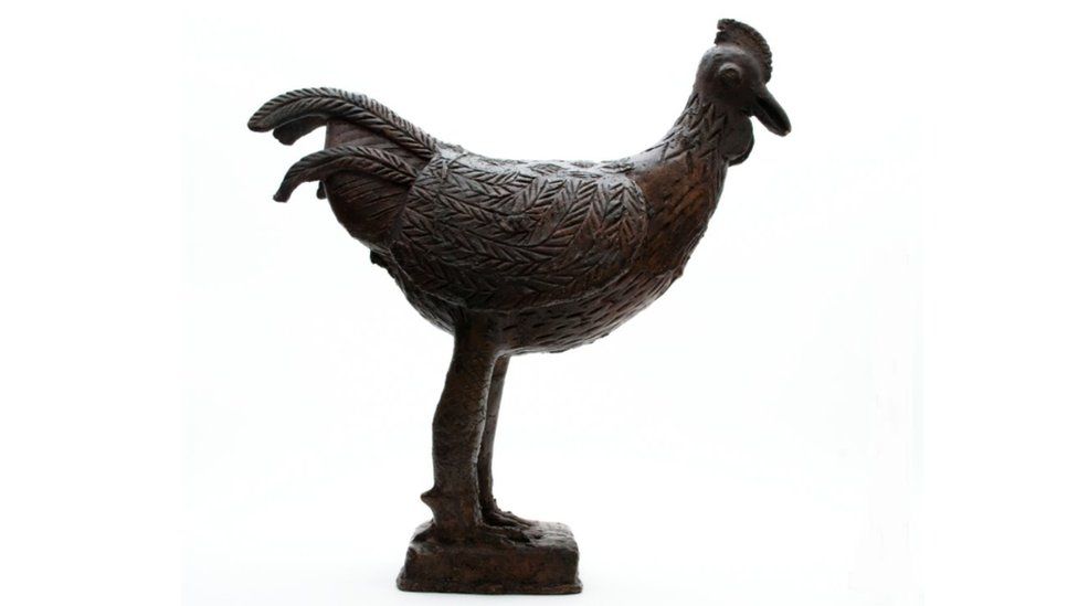 A brass cockerel - called an Ebon - which would be placed on the altar of a dead queen mother