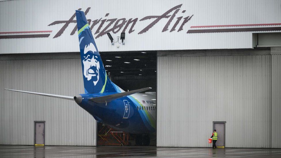 Alaska Airlines N704AL is seen grounded in a hangar at Portland International Airport on January 9, 2024 in Portland, Oregon.