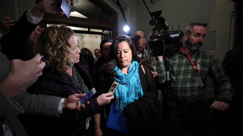Jody Wilson-Raybould, former Canadian justice minister, is surrounded by journalists