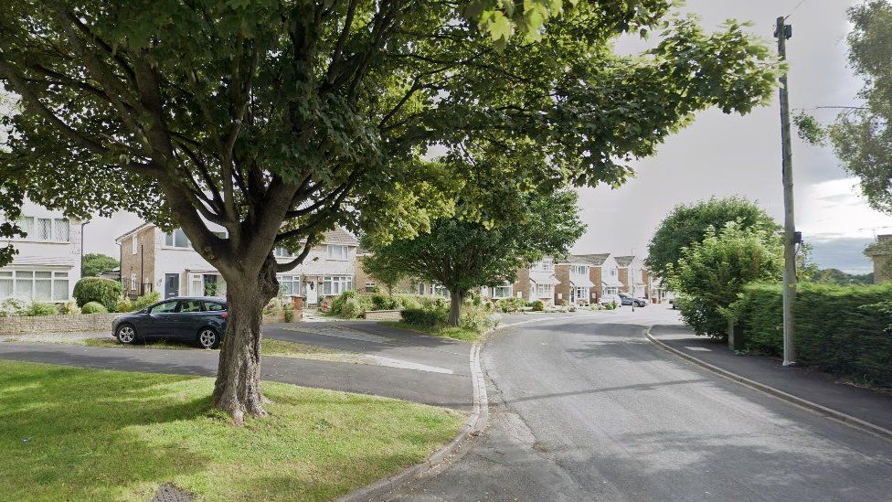 Woman trapped under own car on Leeds driveway seriously hurt BBC News