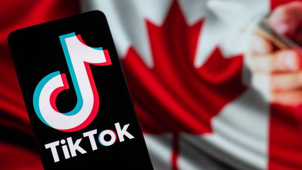 TikTok logo with a Canadian flag behind