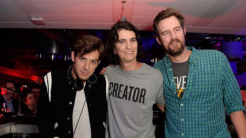 Adam Neumann (centre) with DJ Mark Ronson (left) and Miguel McKelvey, chief creative officer of WeWork attend the WeWork London launch party on 11 November 2015