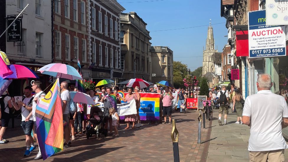 A colourful Pride march through the town centre