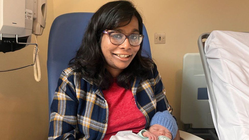 Kanchana Whittle with her newborn baby in hospital