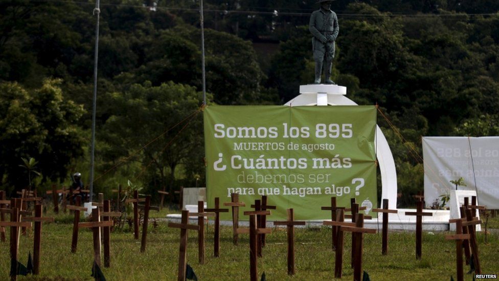 Crosses are left as a protest against the high homicide rate in the country in San Salvador, El Salvador on September 1, 2015.