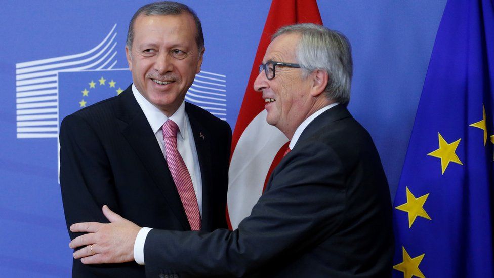 European Commission President Jean Claude Juncker (R) speaks to the media as he welcomes Turkish President Recep Tayyip Erdogan at the EU Commission in Brussels, Belgium, 5 October 2015