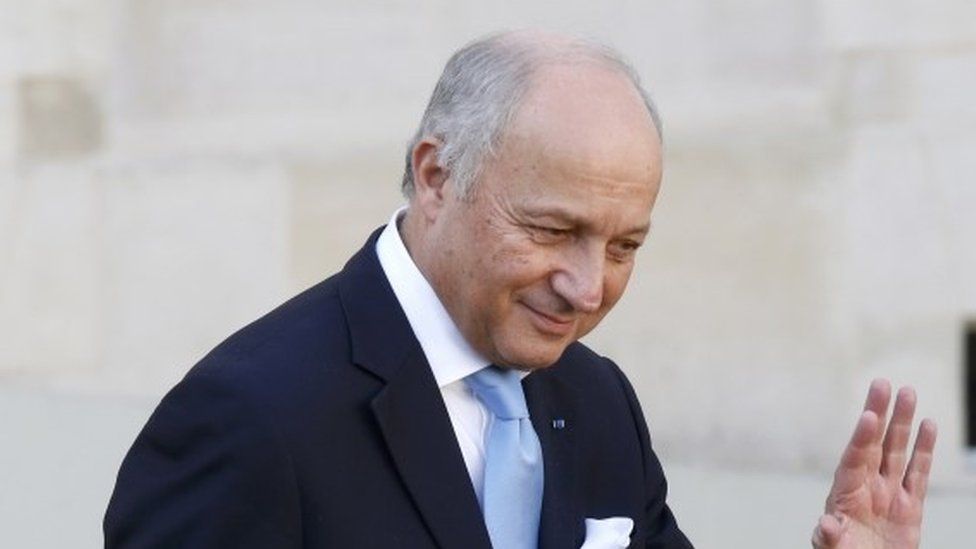 Laurent Fabius leaves the Elysee Palace following the weekly cabinet meeting in Paris, 10 February