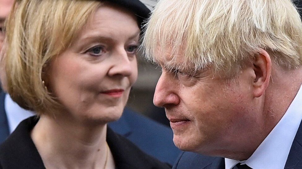 Former UK prime ministers Liz Truss and Boris Johnson attend the Remembrance Sunday ceremony at the Cenotaph on Whitehall on November 13, 2022