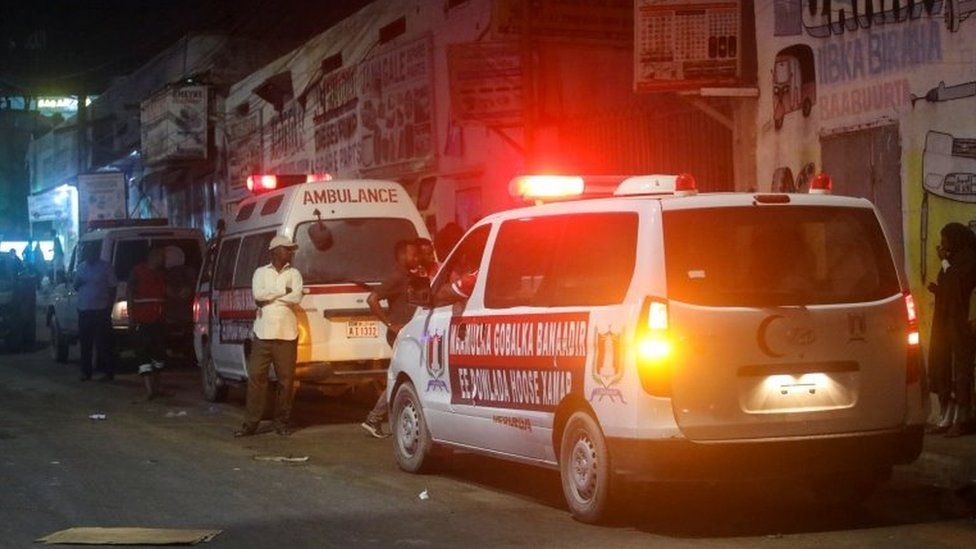 Ambulances are seen near the scene of a car bomb explosion