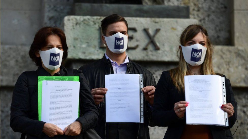 Noi Denunceremo members show the legal complaints they filed in Bergamo, 10 Jun 20