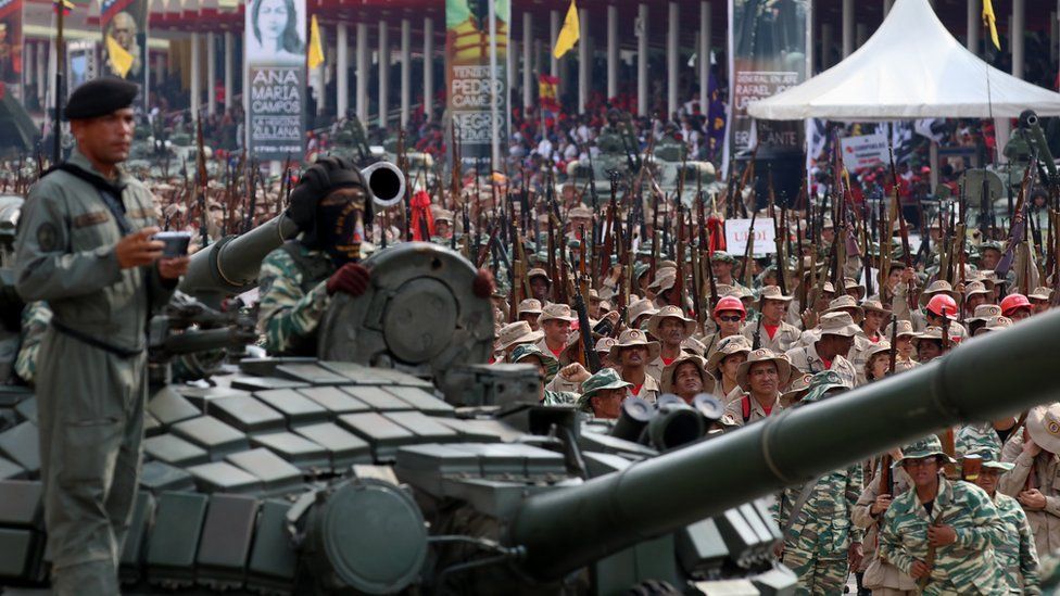 Soldiers take part in a military parade on National Bolivarian Militia Day at Los Proceres in Caracas, Venezuela