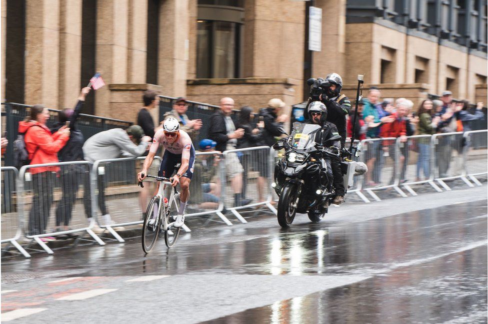 Mathieu van der Poel cycling in the rain in Glasgow