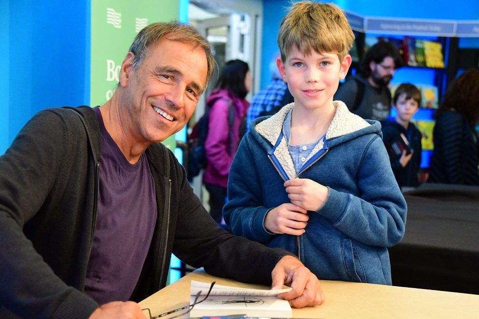 Anthony Horowitz and a young reader