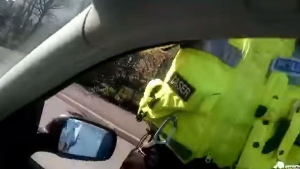 A still from the video after the driver was pulled over