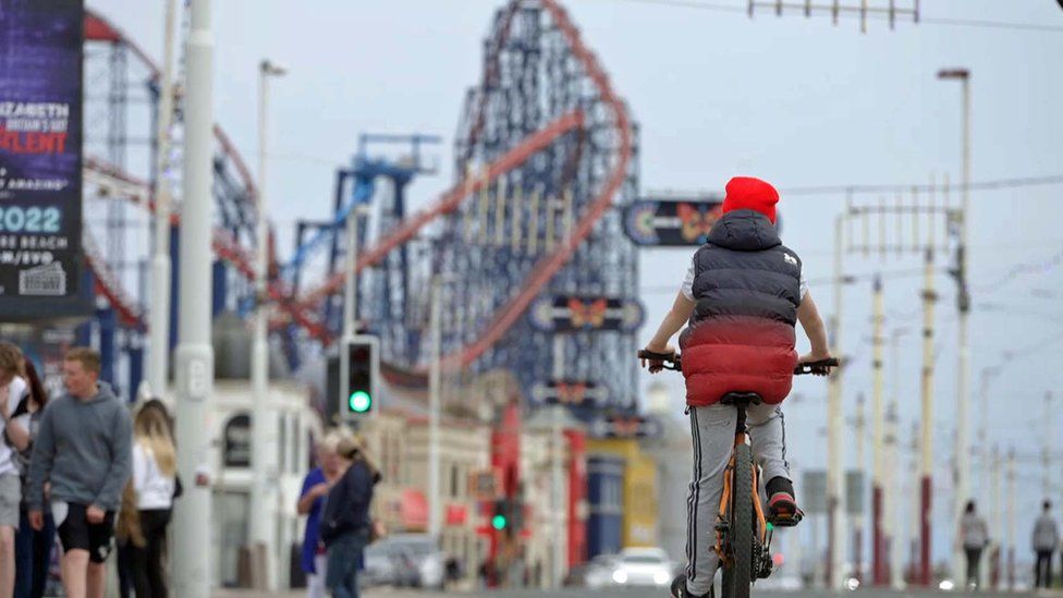 Boy riding bike in Blackpool