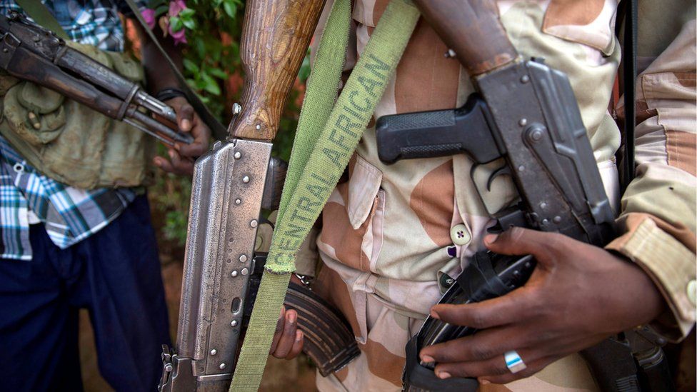 A file photo shows an armed fighter from the 3R armed militia displaying his weapon in the town of Koui, Central African Republic, 27 April 2017