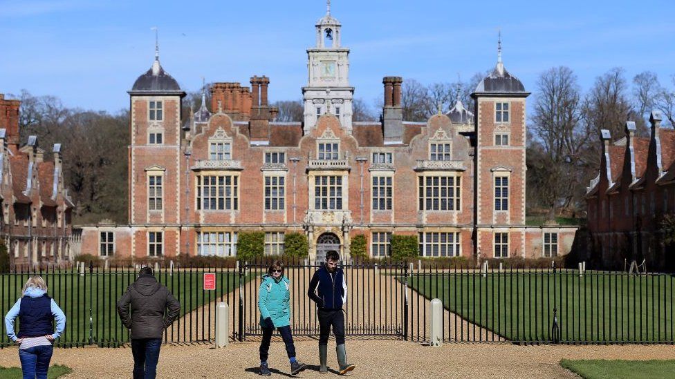 Visitors are seen at Blickling Hall and Estate, in Norwich, which has been closed by the National Trust to help fight the spread of coronavirus