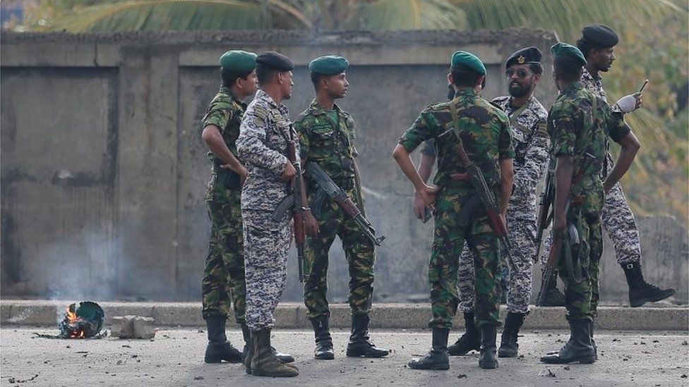 Special Task Force Bomb Squad officers inspect the site of an exploded van near a church that was attacked yesterday in Colombo, Sri Lanka April 22, 2019