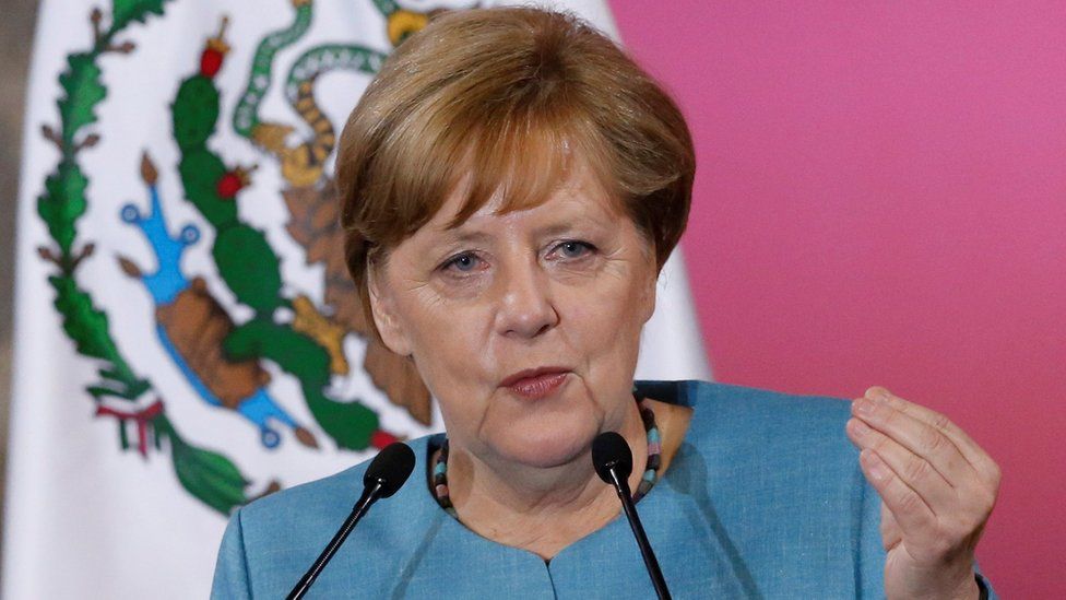 Angela Merkel talks during a press conference in Mexico