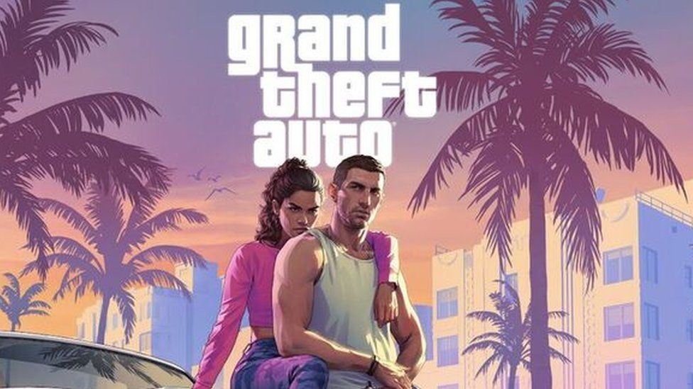 Grand Theft Auto VI trailer still, with a male wearing a white vest and female a pink top. Grand Theft Auto is written in white with two palm trees and a skyscraper visible.