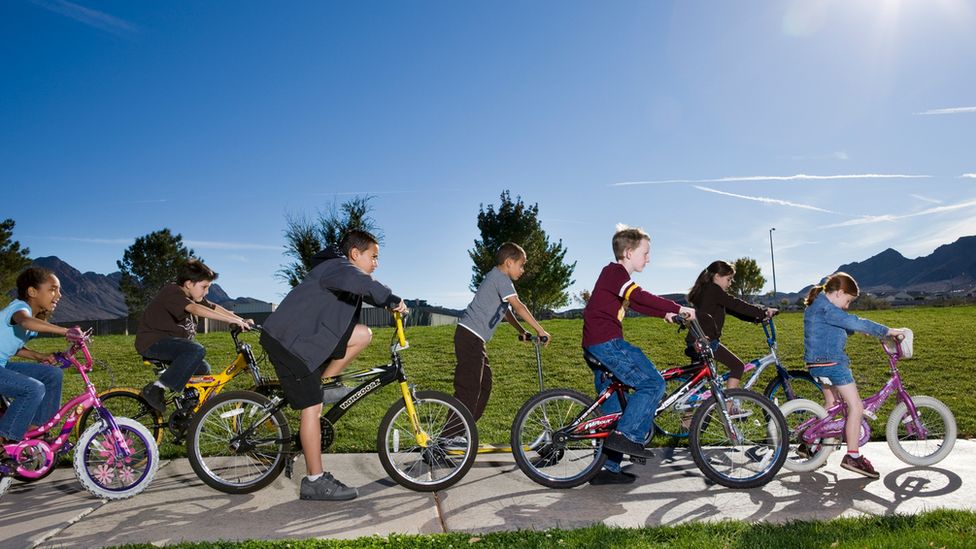 Children riding a bike