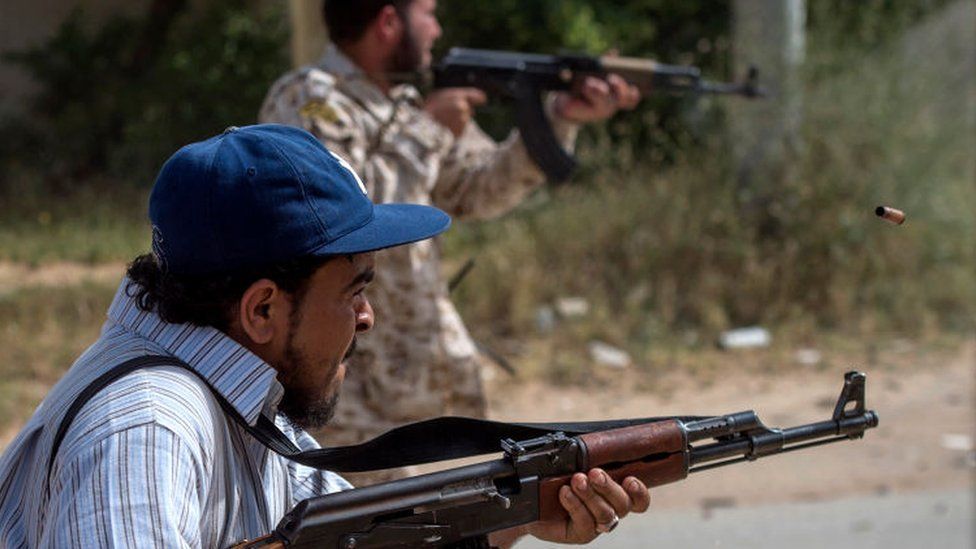 Fighters loyal to the internationally recognised Government of National Accord (GNA) fire their weapons during clashes with forces loyal to strongman Khalifa Haftar south of the capital Tripoli's suburb of Ain Zara, on April 25, 2019.