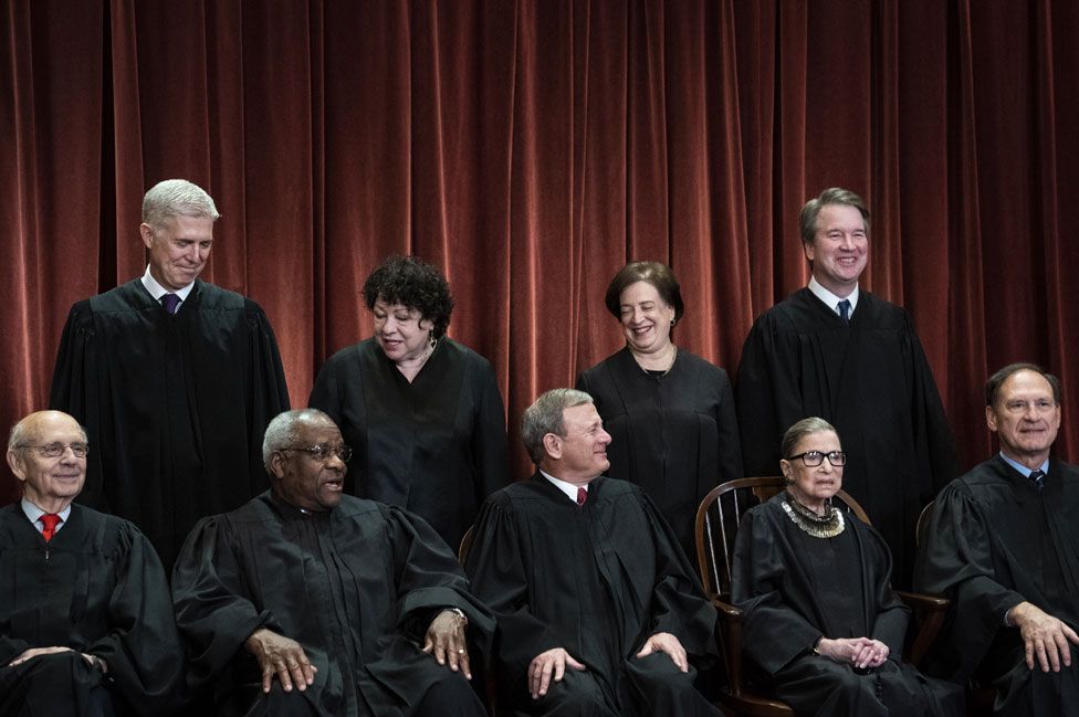 Seated from left, Stephen Breyer, Clarence Thomas, John Roberts, Ruth Bader Ginsburg and Samuel Alito, Jr. Standing from left, Neil Gorsuch, Sonia Sotomayor, Elena Kagan and Brett M Kavanaugh