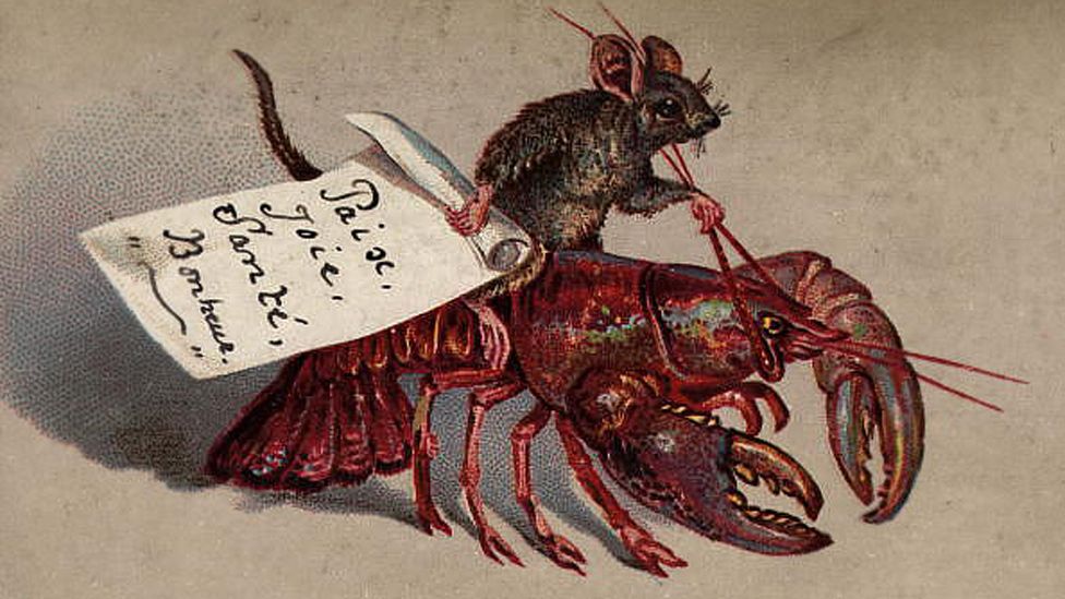 Old card of a mouse riding a lobster, 1880 The card wishes the recipient 'Paix, Joie, Sante, Bonheur' or 'Peace, Joy, Health and Happiness'.