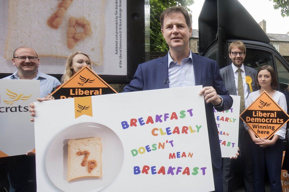 Nick Clegg unveils a campaign poster