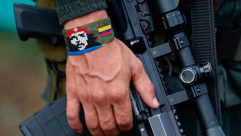 View of the handband of a FARC dissident guerrilla holding a rifle, in Casa Roja, Colombia, 16 April 2023 (issued 17 April 2023)