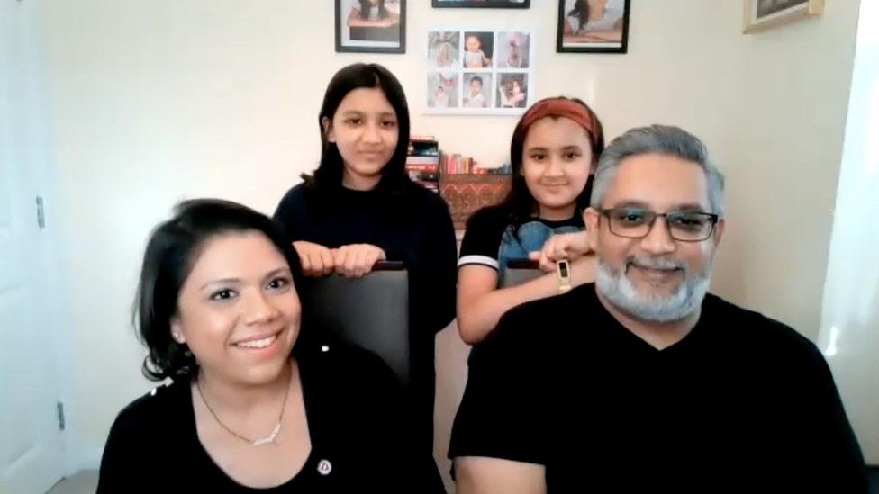 hivali Modha (front left), Hiren Modha (front right) and their daughters Shyaama (top left) and Jyoti (top right) about the positive impact of the COVID-19 vaccine.